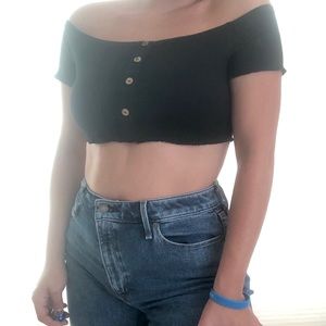 Very cropped black shirt.